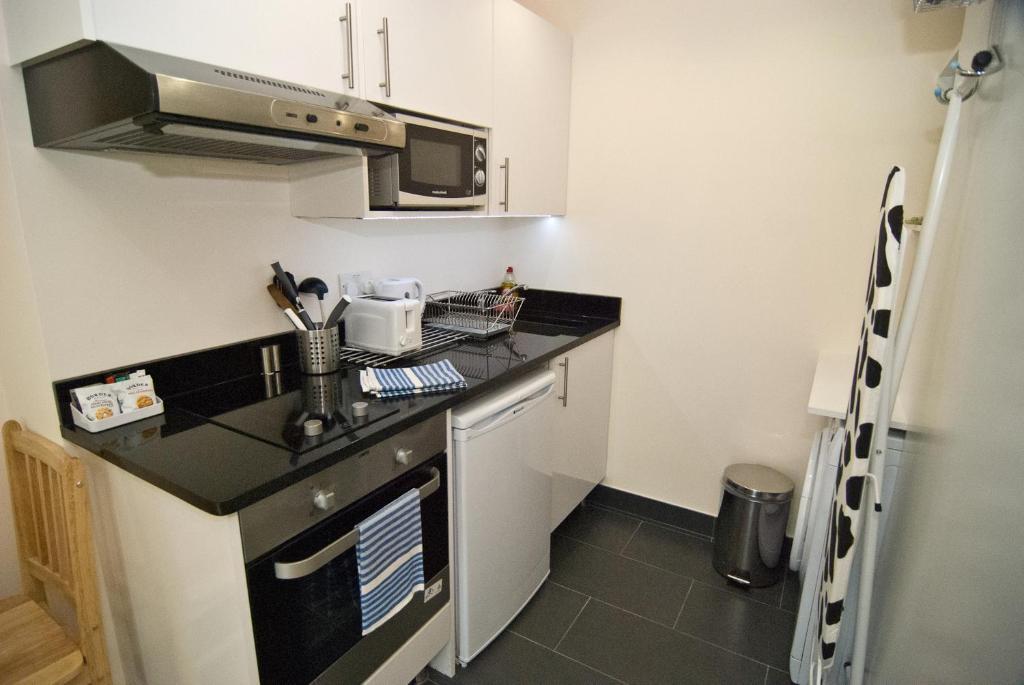 Finsbury Serviced Apartments Лондон Стая снимка